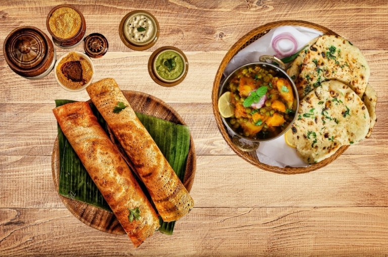Bawarchi Battles: North vs South Indian Wedding Feasts
